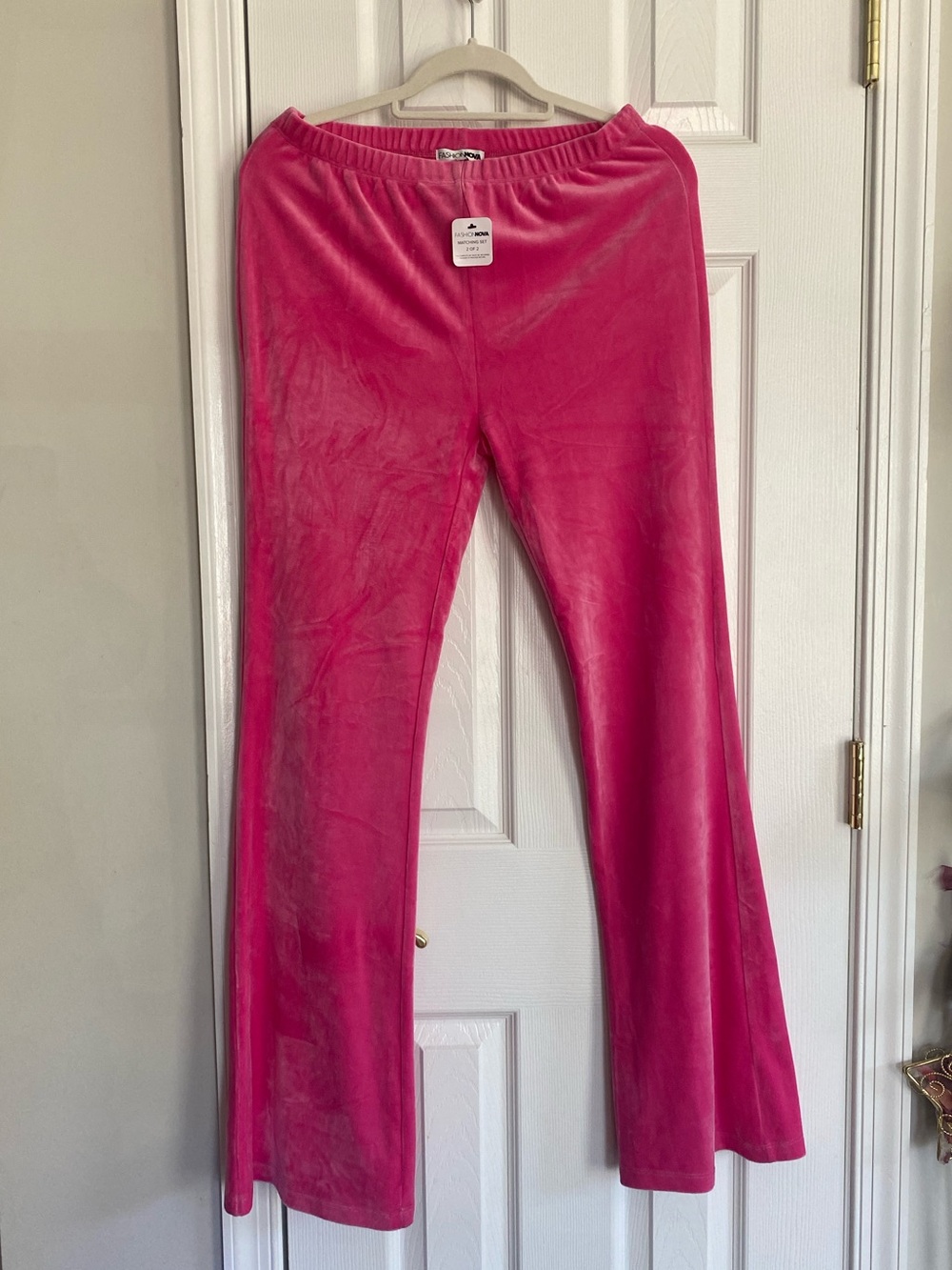 FASHION NOVA HOT PINK VELVET FLARE PANTS